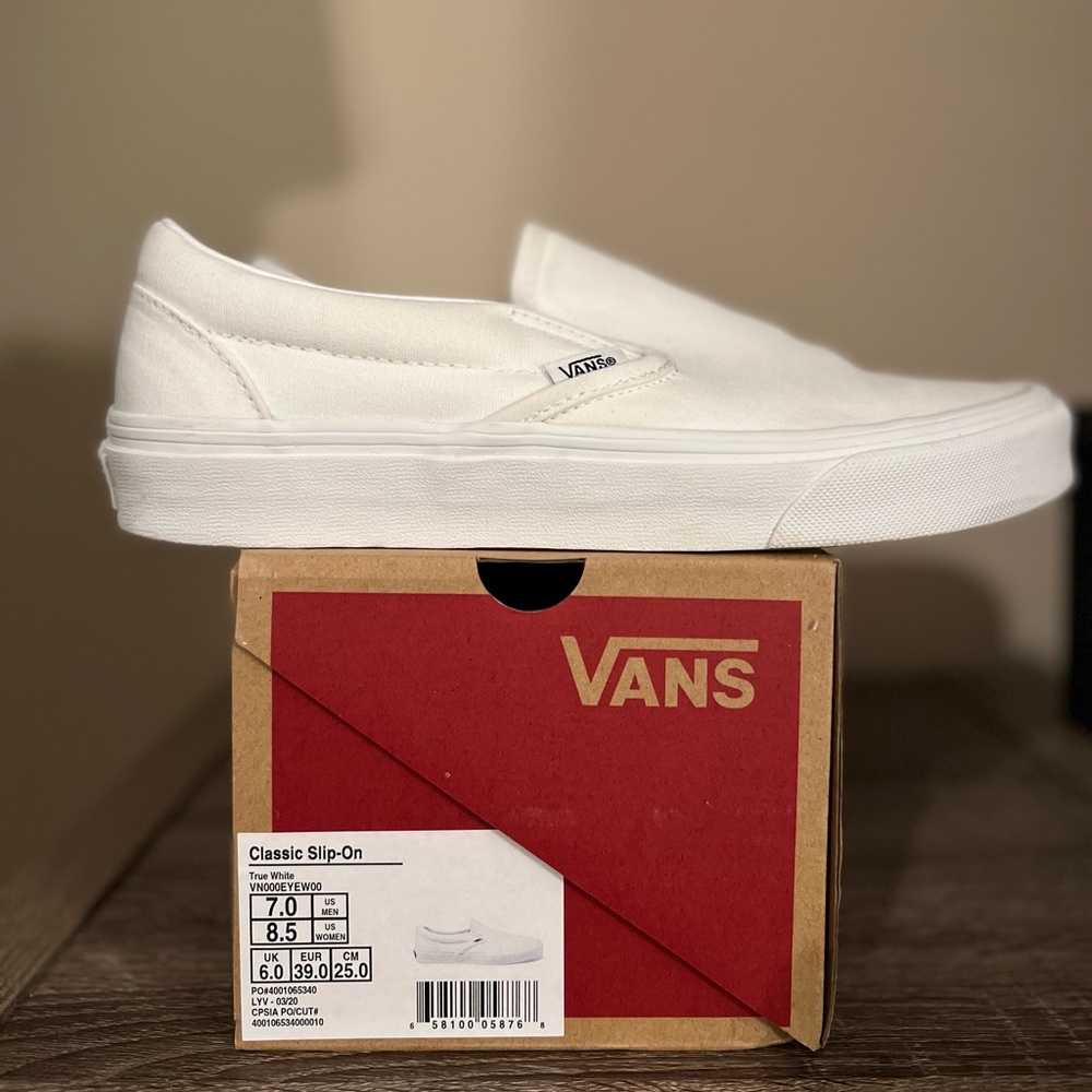 Vans White Classic Slip Ons